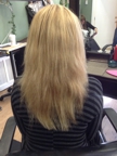 Before having hair extensions added, back view