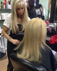 Ellen working on applying hair extensions