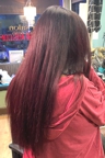 Before having hair extensions added, back view