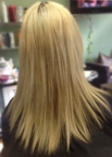 Before having hair extensions added, back view